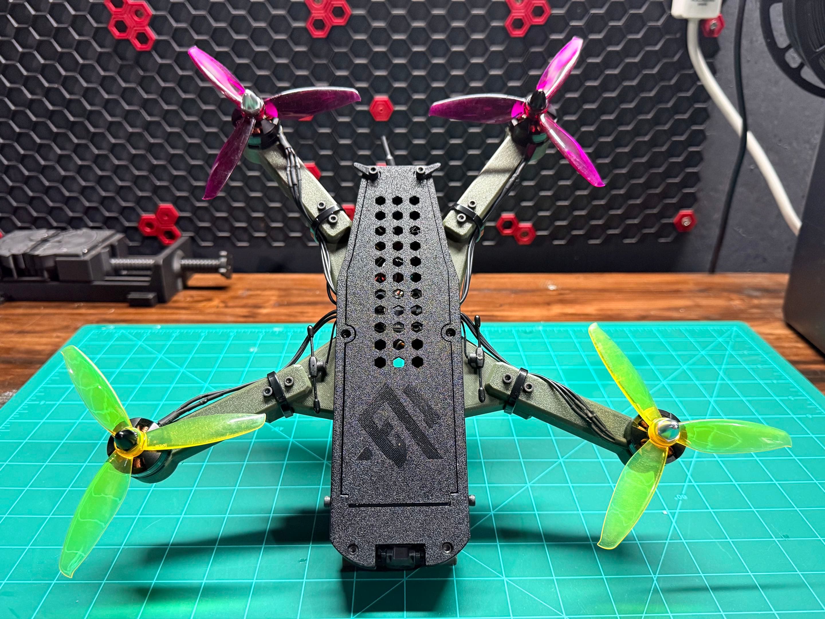 ADAMAAS Nomad angled on its display stand showing the bottom plate
